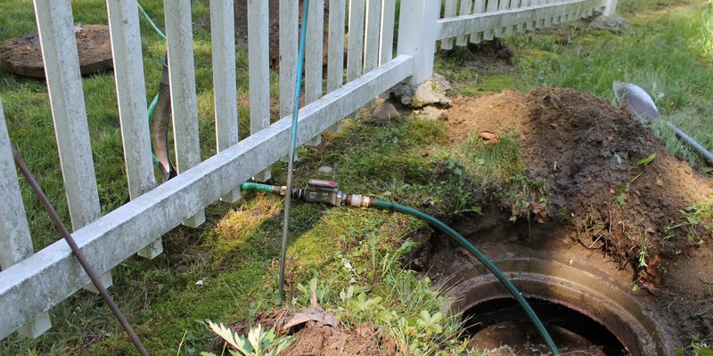 Introduce 150 gallons of environmentally friendly dyed water into the septic system